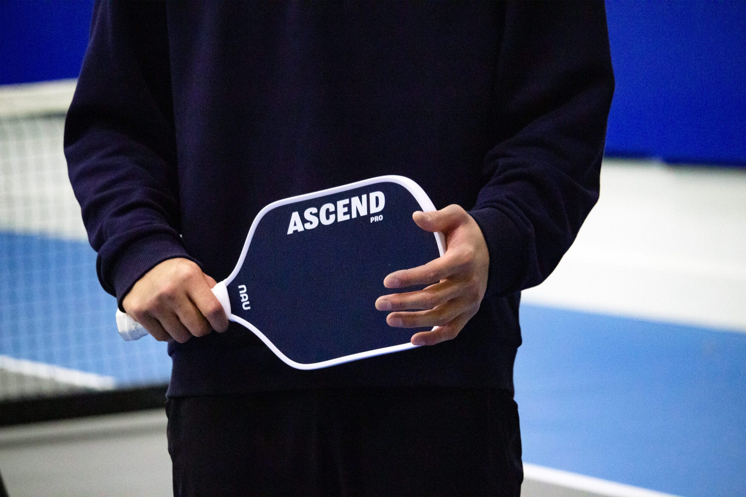 Nau blue paddle held in hands